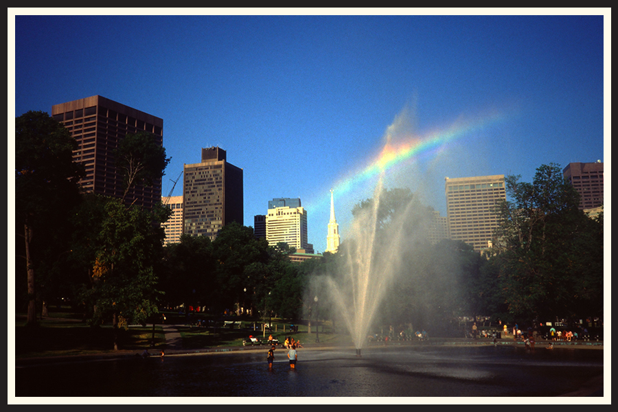 Film photo of children playing in a fountain in Boston
