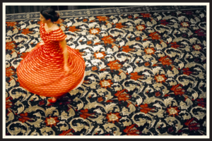 Film photo of a dancer on a patterned carpet in Austin, TX
