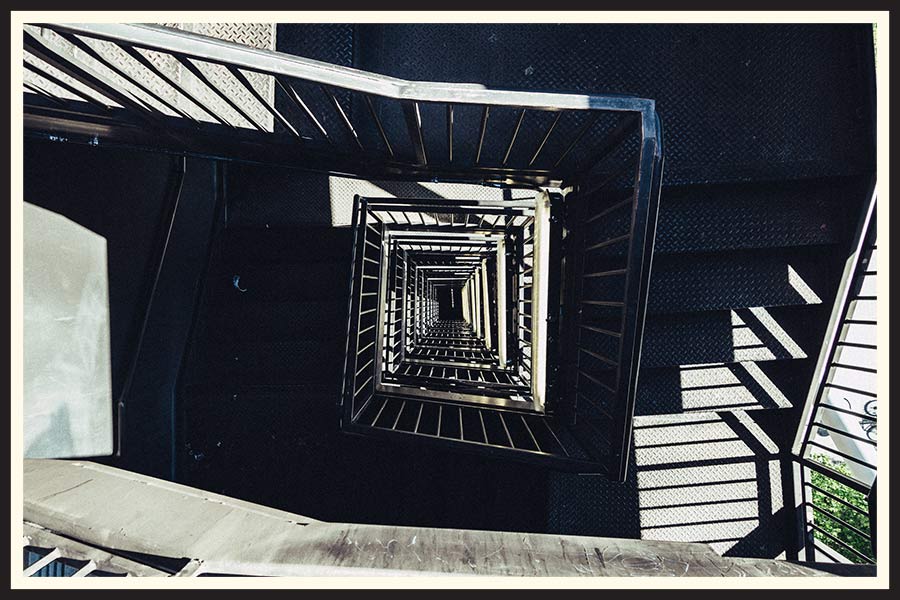Film photo of a symmetrical staircase. 