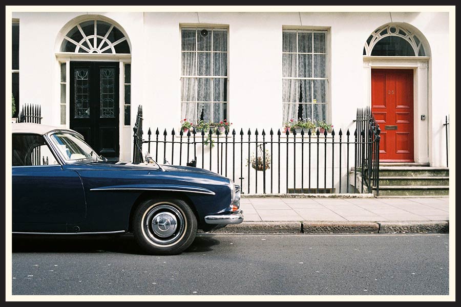 Film photo of a vintage Mercedes on a London street.