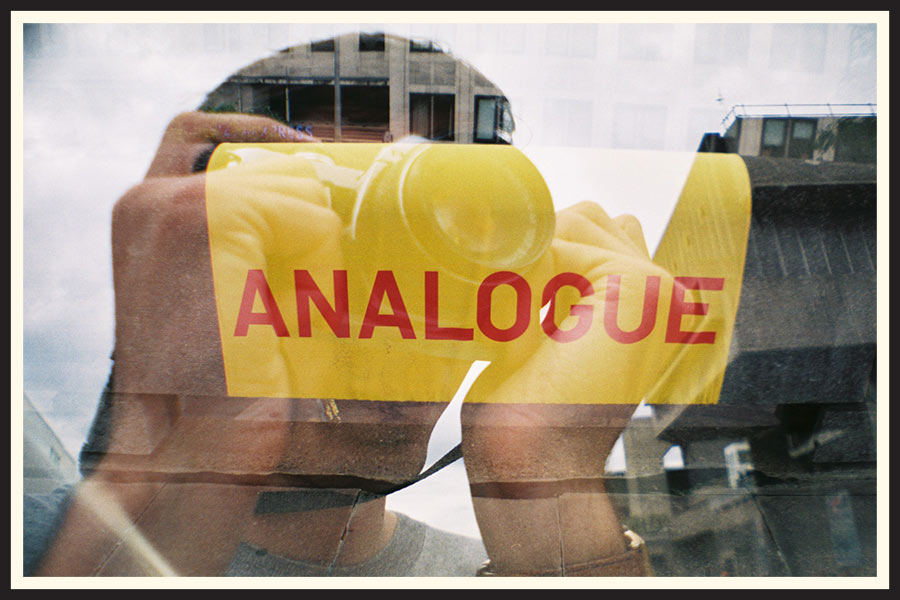 film photo of an "analogue" sign