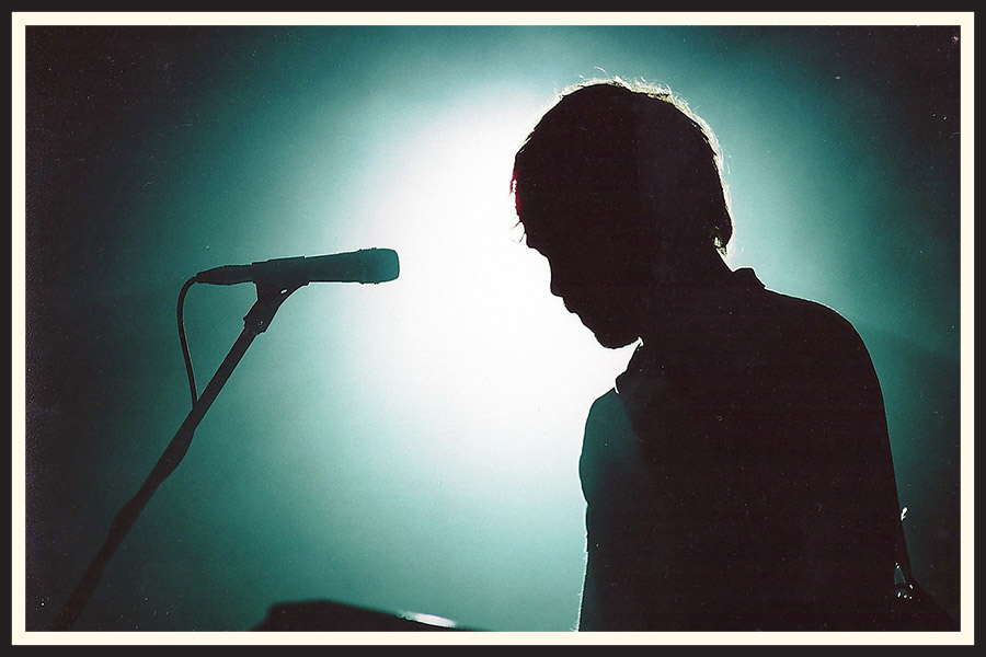 Film photo of a musician on stage at a concert in Adelaide.