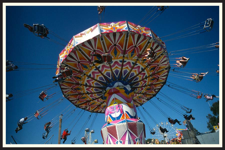 Film photo of a carnival ride.