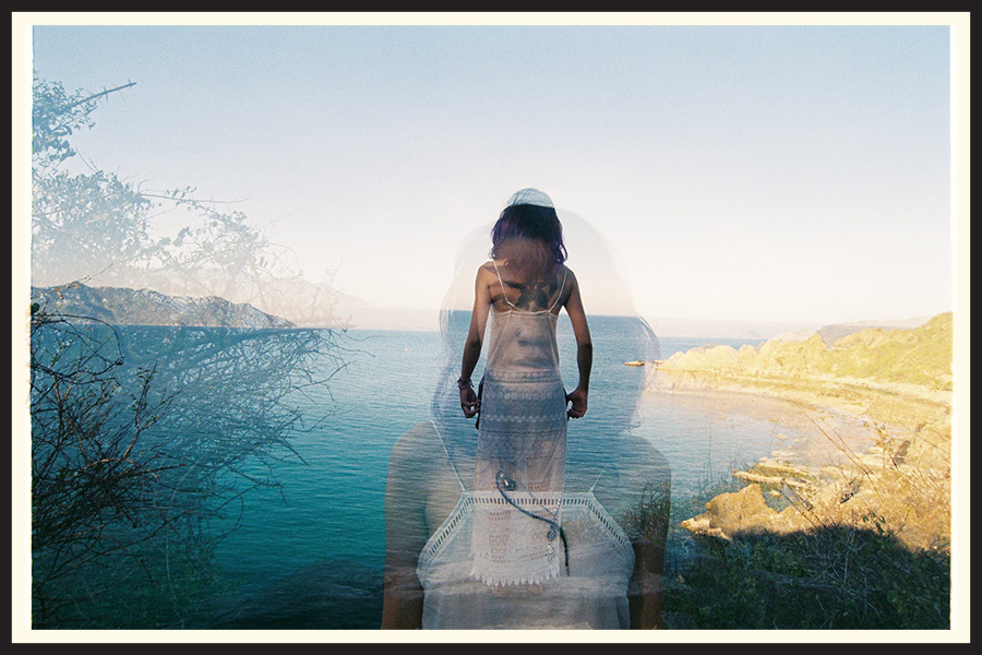A double exposure of a woman in different poses, taken on film.