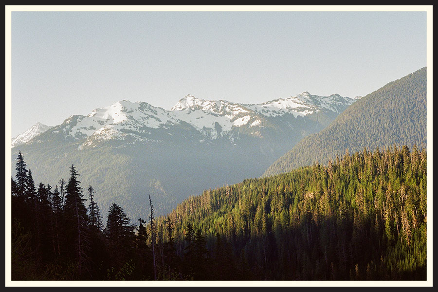 Film photo of a mountain with the foreground in shadows, taken on a Contax G2