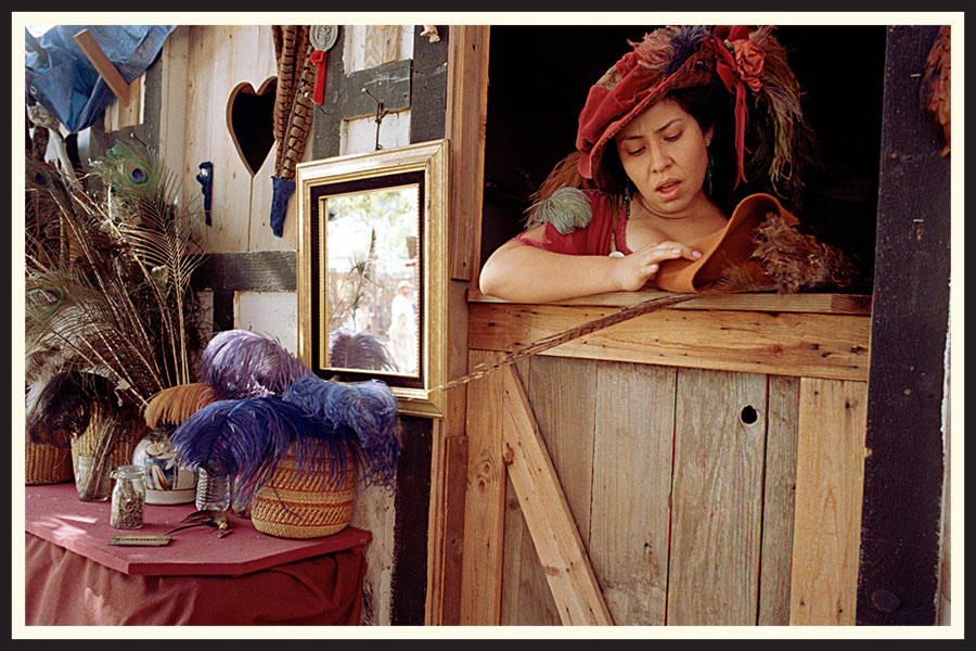 Woman in antique looking clothing, taken on Kodak Colorplus 200 color film.