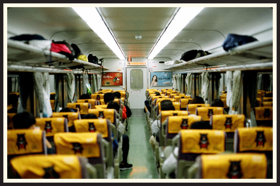 Interior of a train at night, taken on Kodak Colorplus 200 35mm color film.