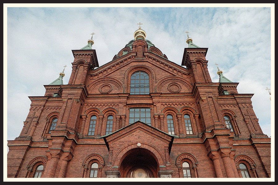 A large, brick church, captured on Kodak Portra 800 color film.